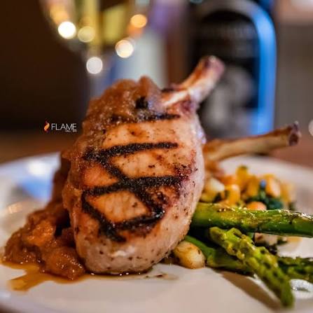 Flame Bar And Grill signature dishes Chicken Marsala
Stuffed Flounder
Bourbon St. Ribeye